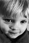Little boy smiling at camera, close-up, portrait