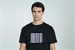 Man wearing tee-shirt with bar code, portrait