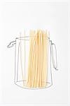 Real pasta on drawing of canister