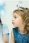 Little girl wearing tiara, profile