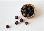 Blackberries spilling out of basket