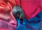 Multicolored fabrics, close-up, full frame