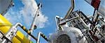 Power plant, low angle view, blue sky in background