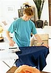 Man ironing clothes