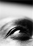 Man's eye, low angle view, close up, black and white.