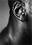 Man's ear, close up, black and white.