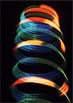 Spiraling light effect, reds, blues and yellows.