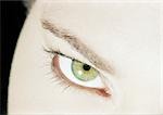 Woman's green eye, close up.