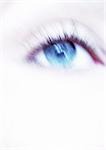 Woman's blue eye, close-up, blurry.
