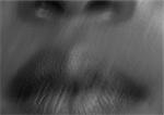 Close up of woman's mouth, black and white, blurry.