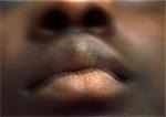 Close up of woman's mouth, blurry.