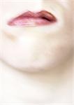 Close up of woman's mouth, blurry.