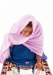 Muslim woman praying, blurry.