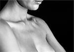 Woman's bare chest, close-up, B&W