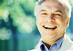 Mature man smiling, close-up, portrait