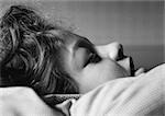 Girl sleeping, close-up, b&w