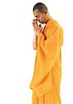 Buddhist monk standing, meditating