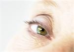 Senior woman's eye, close-up, blurred