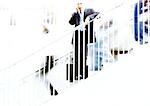 Businessman on stairs, blurred