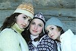 Young friends wearing winter clothing, portrait