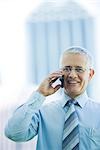 Businessman using cell phone