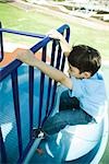 Child on playground equipment