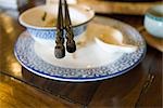 Plate with bowl, soup spoon and chopsticks