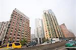 China, Guangdong Province, Guangzhou, street and high rises