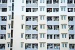 High rise apartment building, laundy hanging out to dry on balconies