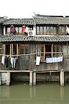 China, Guangdong Province, houses along canal