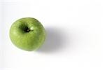 Granny smith apple with water droplets, viewed from directly above