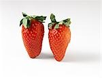 Two fresh strawberries, close-up