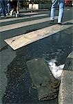 Crosswalk water pouring into gutter