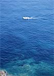 Motor boat in sea, high angle view