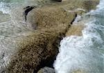 Water running over rocks, close-up