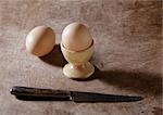 Eggs, eggcup and knife