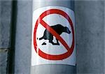 No dog poop sign on pole, close-up