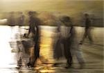 Israel, Jerusalem, people walking at dusk, blurred motion