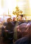 Israel, Jerusalem, procession with cross at the Church of the Holy Sepulchre, blurry.