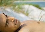 Man lying on beach