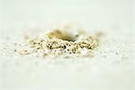 Hole in fiberboard, sawdust, close-up, selective focus