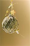 Ornate gold Christmas tree ornament