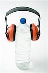Water bottle wearing protective ear muffs