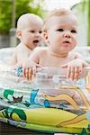 Two Babies in Inflatable Pool