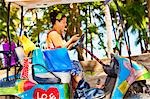 Woman shopping with golf cart in mexico