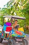 Woman shopping with golf cart in mexico