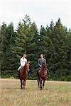 Couple Riding Horses, Brush Prairie, Washington, USA