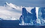 Tabular icebergs and Graham Land. Antarctic Peninsula.
