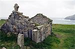 A ruined chapel looks out over the sea at Cape Cornwall near St Just on Cornwall's north coast,England