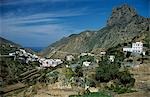 The whitewashed houses of Vallehermoso village sit amongst the palm groves and tightly terraced hillsides of La Gomera